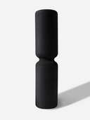 Sperax massage roller placed on yoga mat, easing sore muscles after workout.
