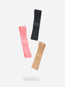 Sperax performance headband on table beside gym gear, keeping sweat away during exercise.